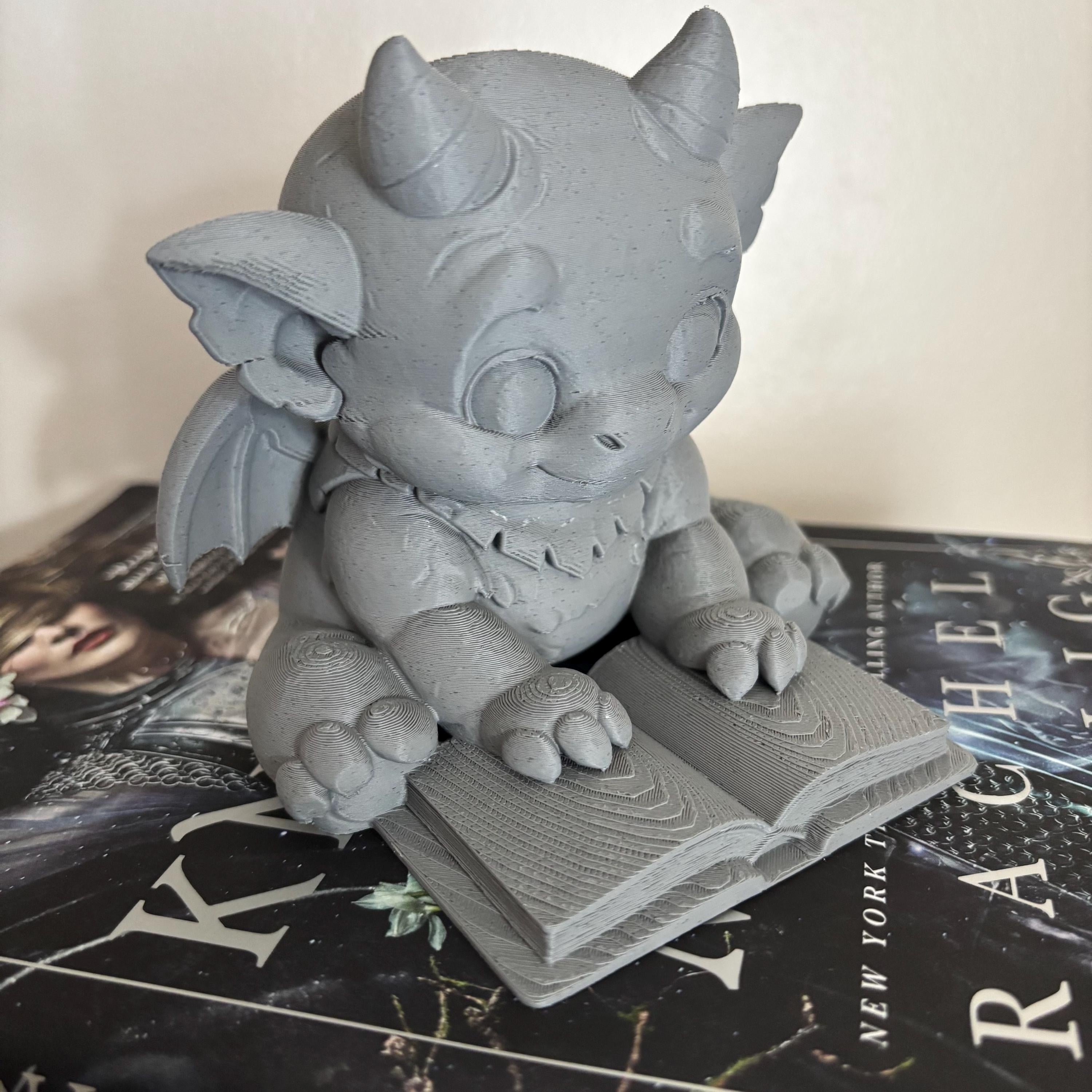 Cute Bartholomew Reading a Book, Stone Gargoyle, The Knight and the Moth