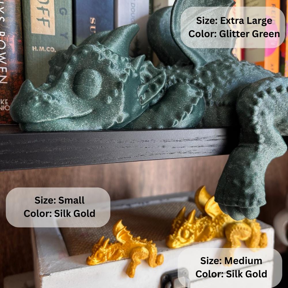 Three dragons side-by-side—small, medium and large PLA versions—showing size scale for book nook collectors. Colors include silk gold, glitter green or sparkle green pla for customers to choose from