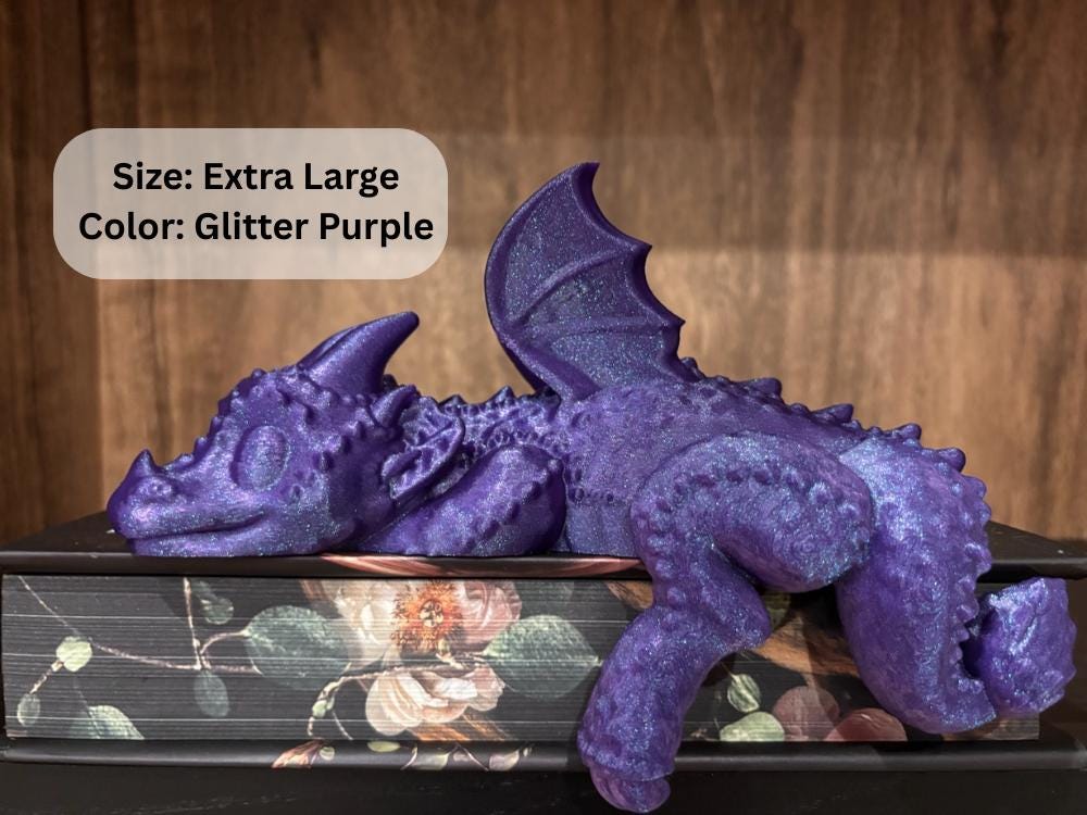 Extra large (~9 ½″) PLA dragon draped across a book, enchanting Empyrean-series bookshelf guardian