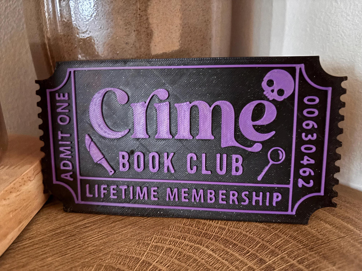 Black and purple Crime Book Club ticket with skull detail